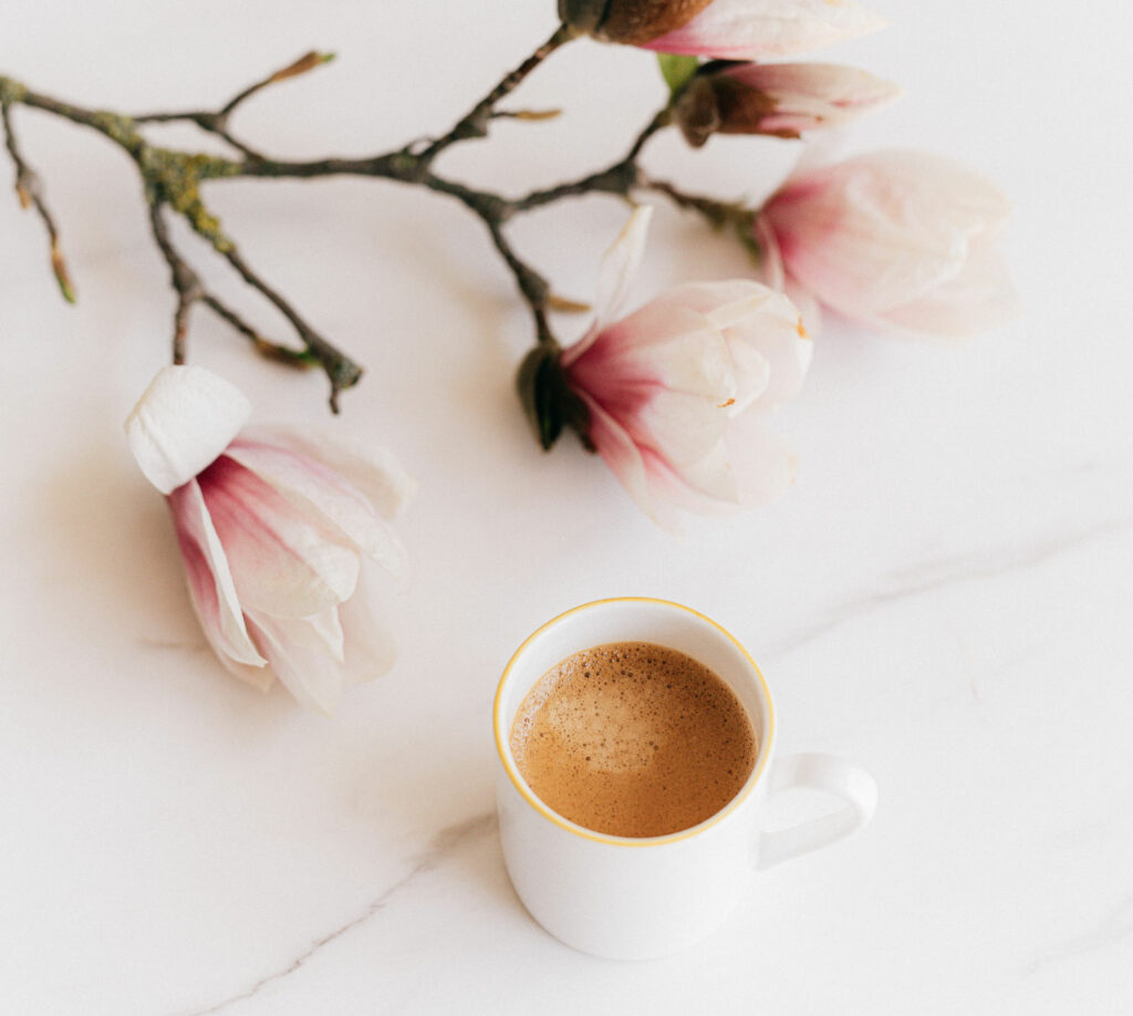Cup of Coffee and Flowers