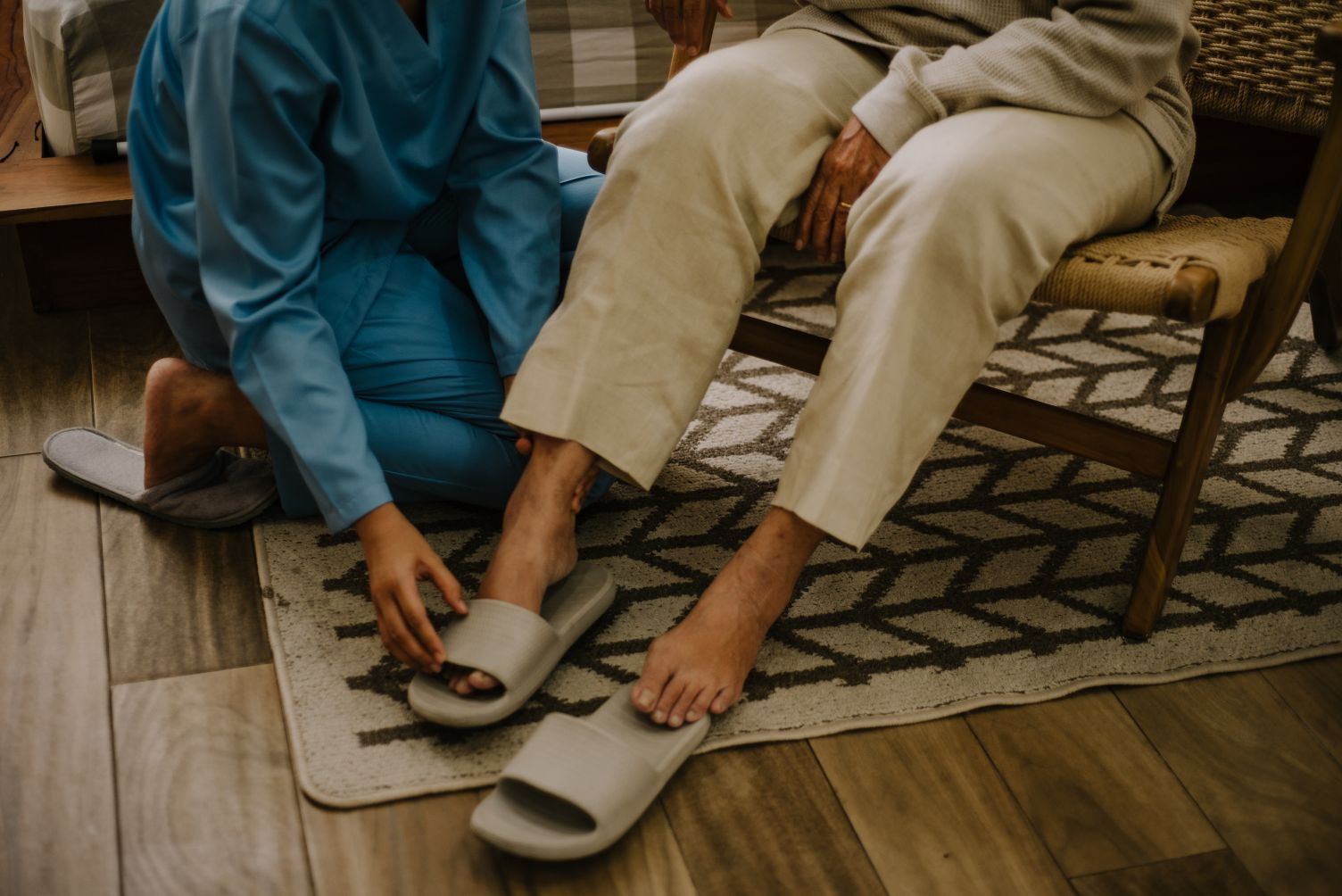 Nurse Taking Care of an Elderly Woman