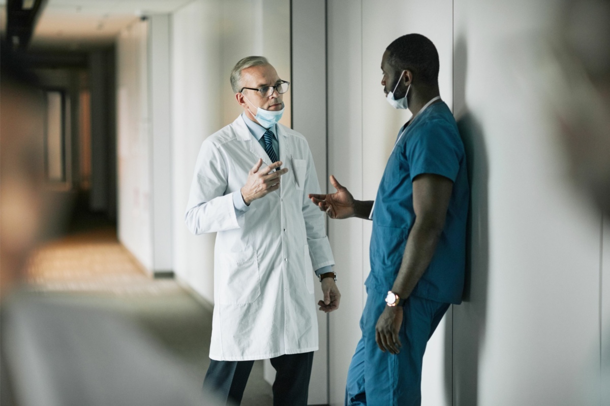 Two Doctors Chatting in Clinic