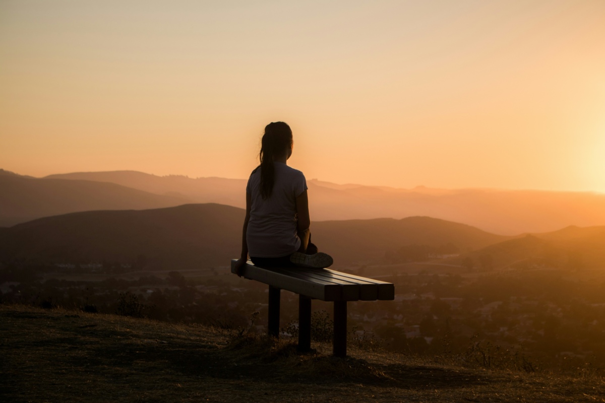 Sitting on a bench watching sunset