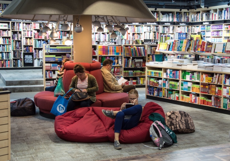 Library with group reading on bean bags and seats